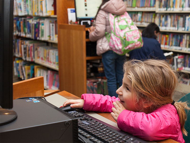 Little girl using computer